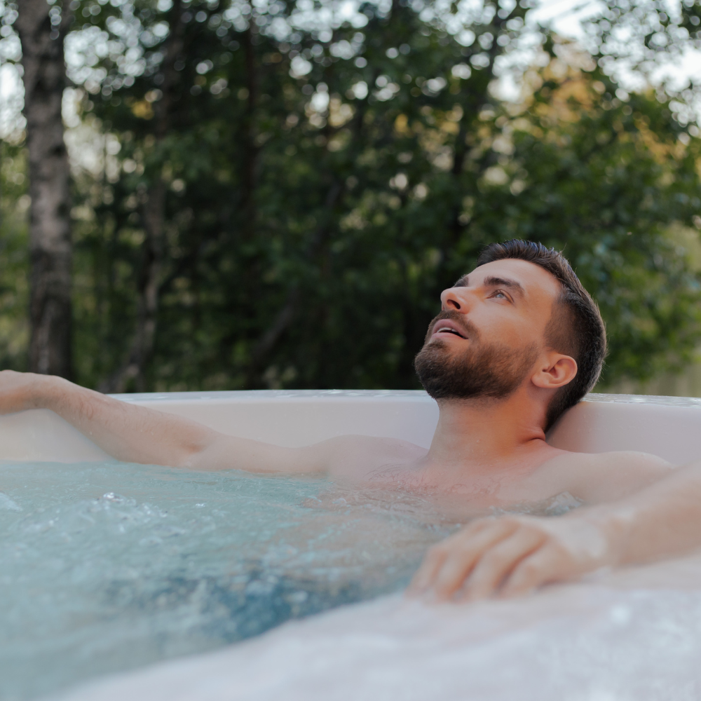 Man relaxing in a Crystec Spas hot tub in Cyprus